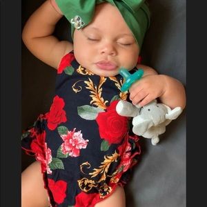 Gorgeous black gold and red romper